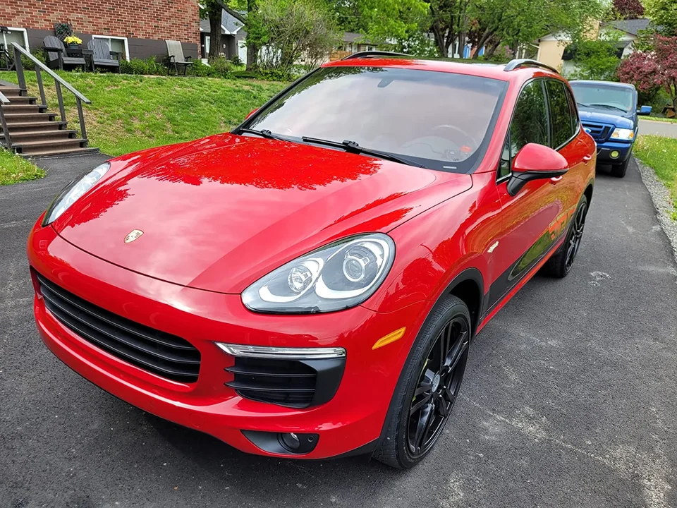 Glossy red Porsche Cayenne after coating